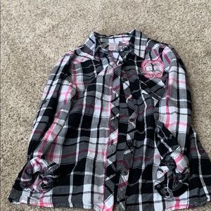 I’m selling this button-down flannel